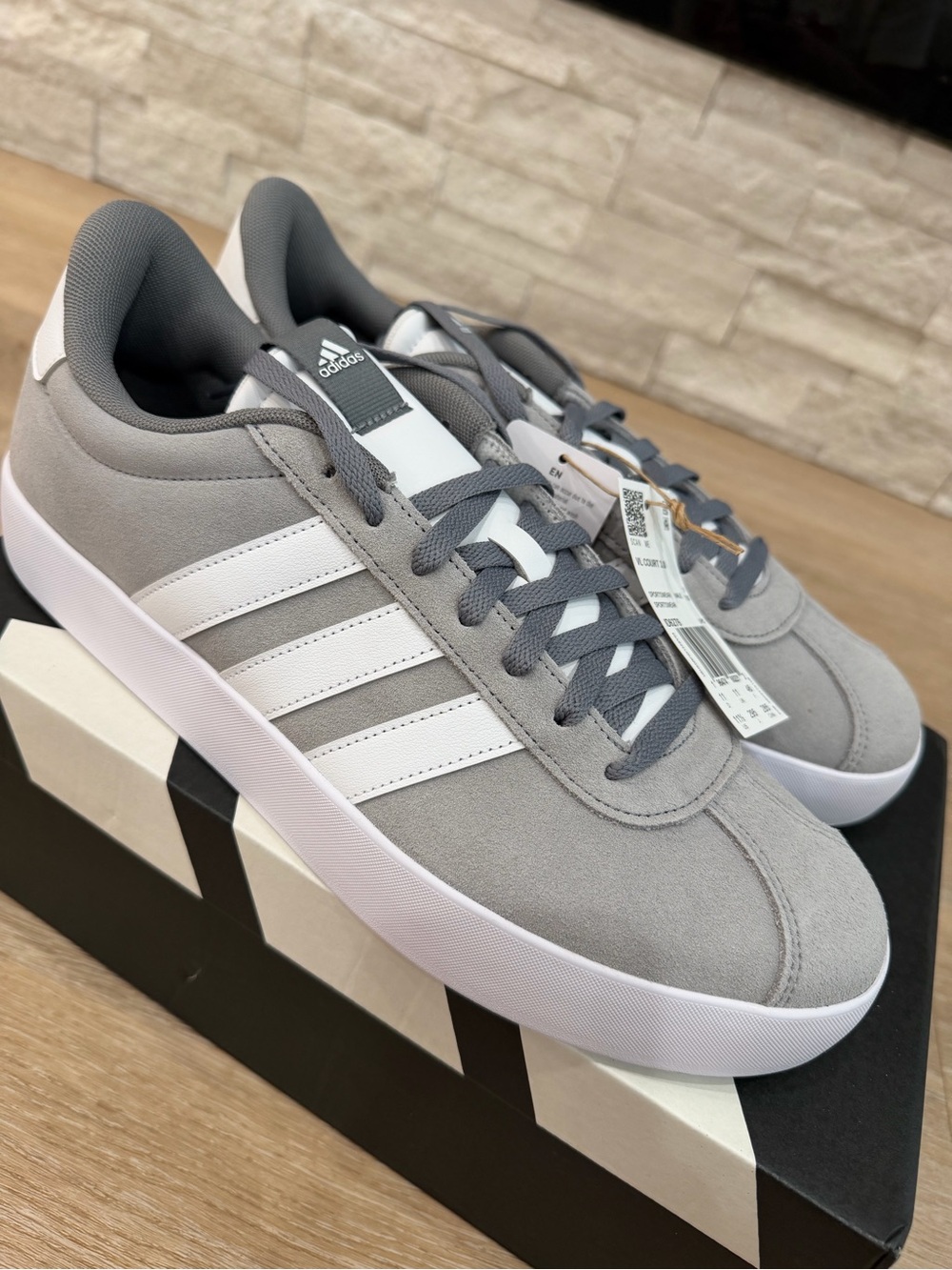 adidas men’s Gray and White Suede Low-Top Sneakers